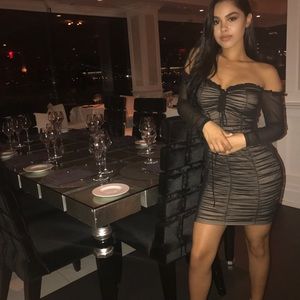 Black & beige long sleeve bodycon dress.